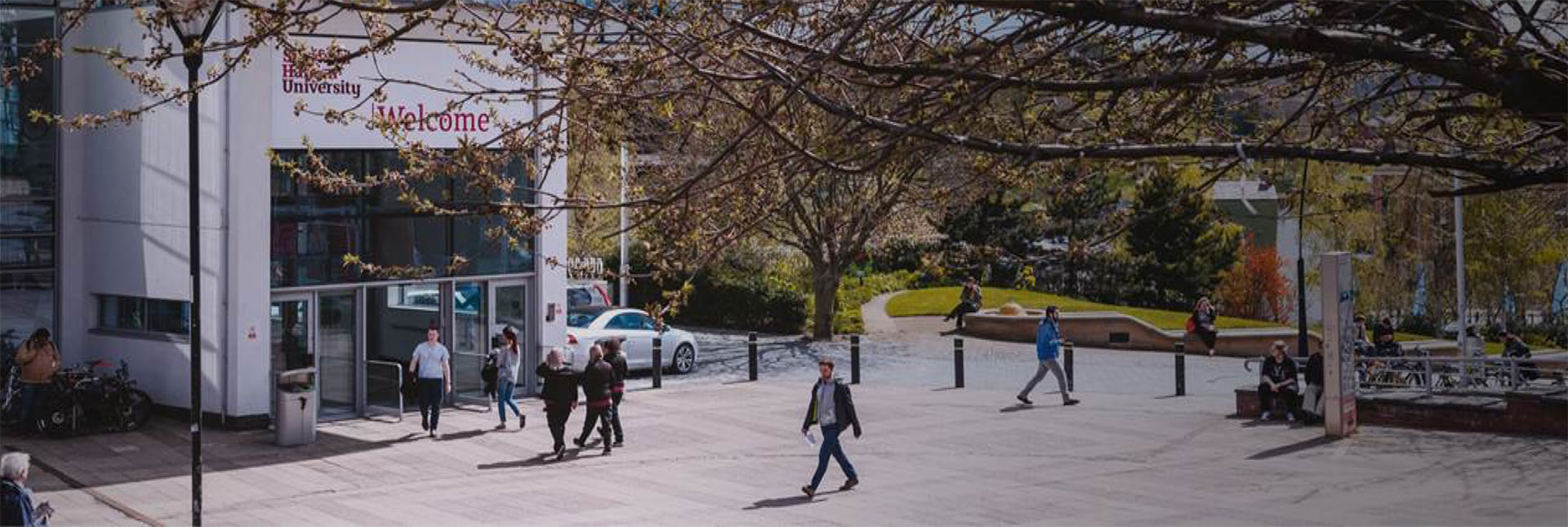 Students walking through the main entrance at Sheffield Hallam University